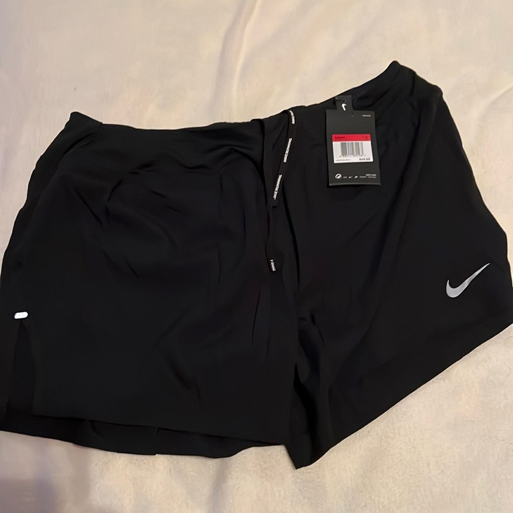 NWT - women’s Nike running shorts